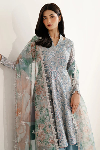 Woman wearing a traditional outfit with embroidered chiffon anarkali top and light blue palazzo pants on a plain backgroundWoman wearing a traditional outfit with embroidered chiffon anarkali top and light blue palazzo pants on a plain background