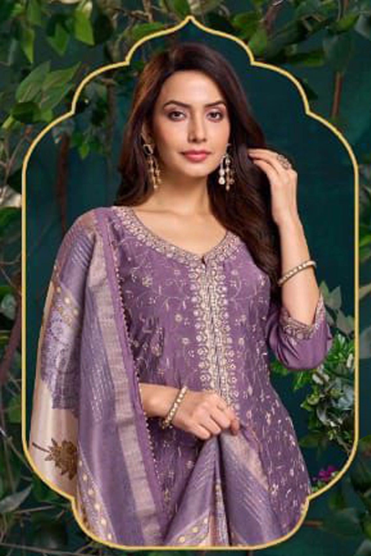 Woman wearing a purple embroidered traditional outfit with a decorative frame against a green leafy background