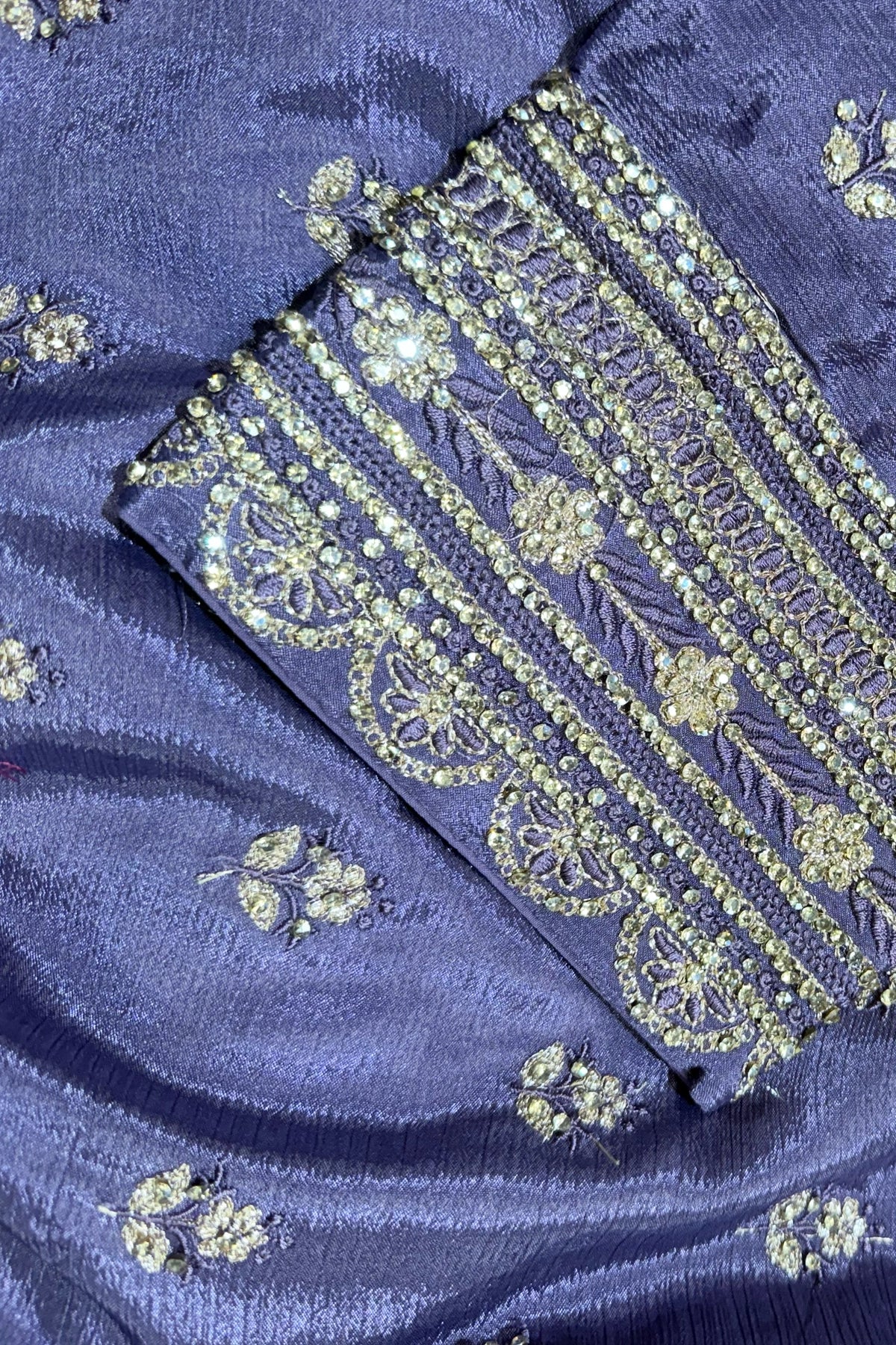 Blue sharara suit close up with gold embroidery