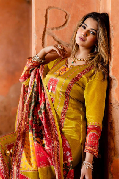 Women wearing Mehendi Green Crepe Silk Palazzo Style Kurta SetWomen wearing Mehendi Green Crepe Silk Palazzo Style Kurta Set