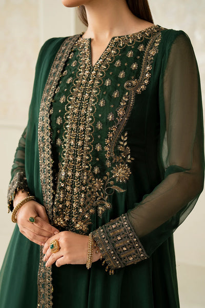 Woman wearing a green embroidered traditional anarkiali outfit with a chiffon dupatta against a neutral backgroundWoman wearing a green embroidered traditional anarkiali outfit with a chiffon dupatta against a neutral background