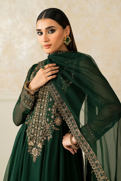 Woman wearing a green traditional outfit with a matching shawl against a neutral backgroundWoman wearing a green traditional outfit with a matching shawl against a neutral background
