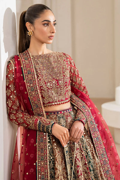 Woman wearing a traditional red embroidered Chiffon Bridal Lehenga outfit with a red dupatta in a neutral settingWoman wearing a traditional red embroidered Chiffon Bridal Lehenga outfit with a red dupatta in a neutral setting