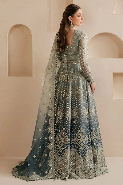 Woman wearing a traditional Lehenga choli outfit with intricate designs in a neutral settingWoman wearing a traditional Lehenga choli outfit with intricate designs in a neutral setting