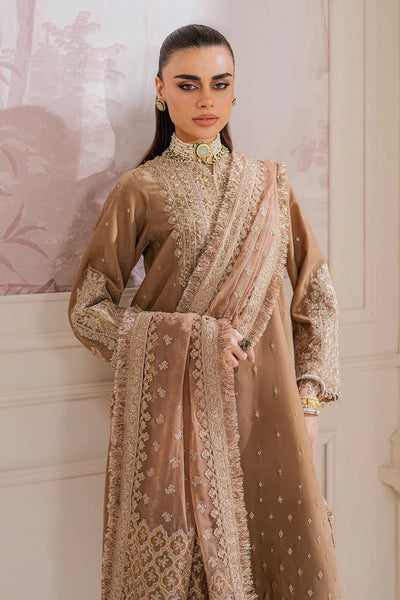 Woman wearing a beige velvet salwar suit embroidered outfit in a minimalistic settingWoman wearing a beige velvet salwar suit embroidered outfit in a minimalistic setting