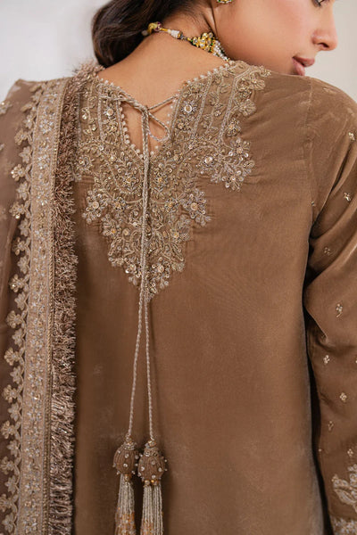 Brown embroidered traditional outfit with intricate detailingBrown embroidered traditional outfit with intricate detailing