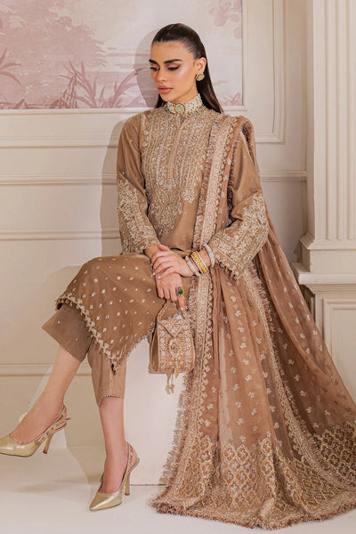 Woman wearing a beige velvet salwar suit embroidered outfit in a minimalistic settingWoman wearing a beige velvet salwar suit embroidered outfit in a minimalistic setting