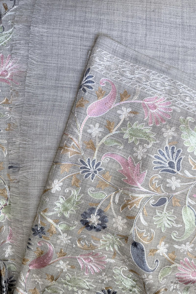 Embroidered shawl with floral kashmiri work on a gray background