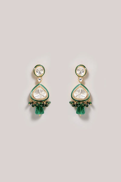 Pair of Kundan Polki green teardrop earrings with gemstone-like elements on a light gray backgroundPair of Kundan Polki green teardrop earrings with gemstone-like elements on a light gray background