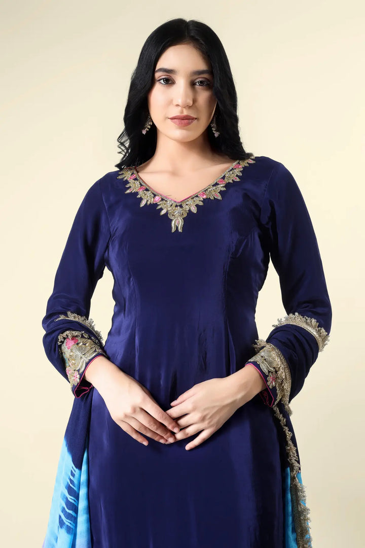 navy blue punjabi dress A rich blue wedding Punjabi suit adorned with delicate handwork, bringing a warm and earthy elegance to the look. The classic silhouette paired with subtle desi detailing creates the perfect balance of