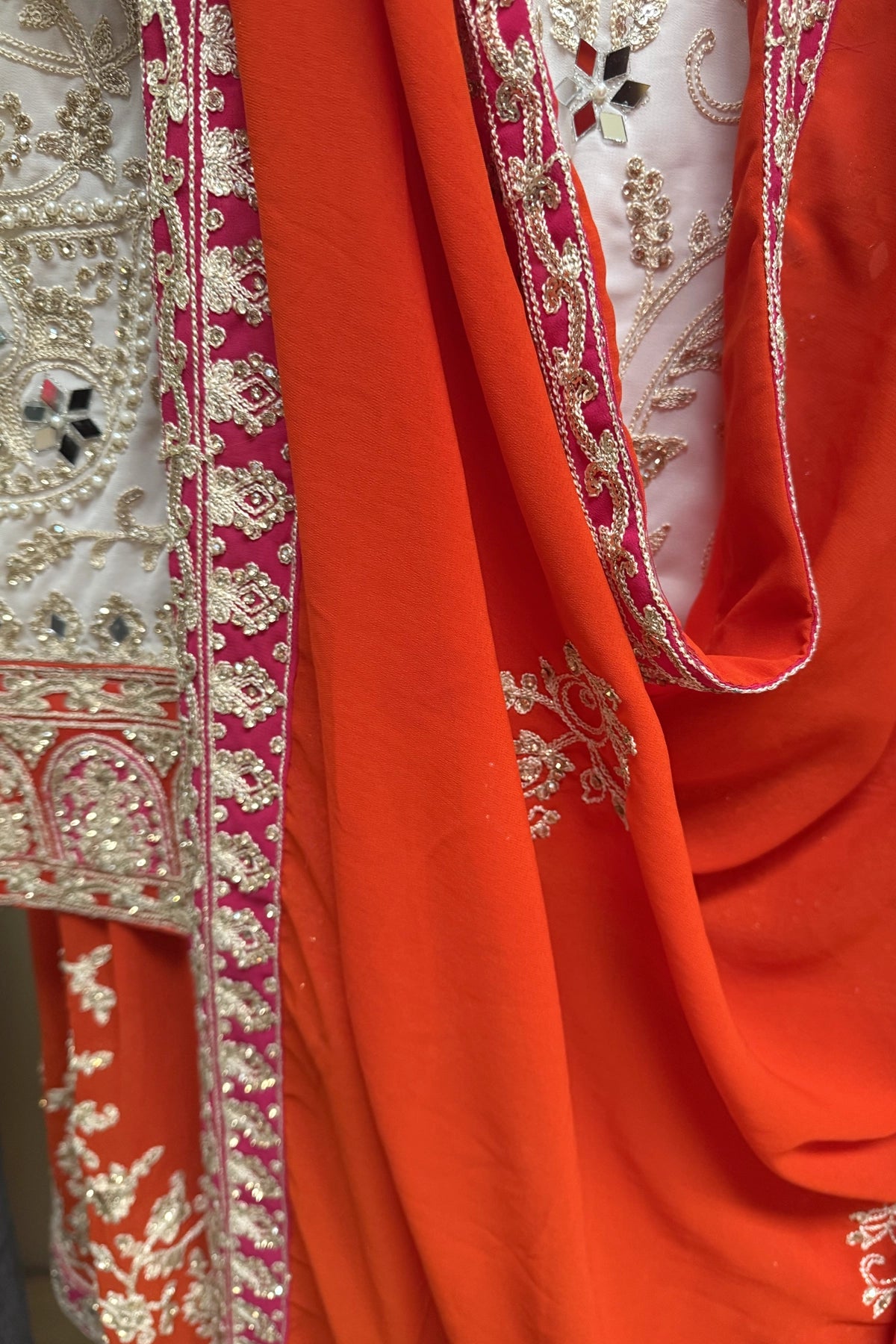 White & Orange Georgette Sharara Set With Mirror Sequins & Handwork