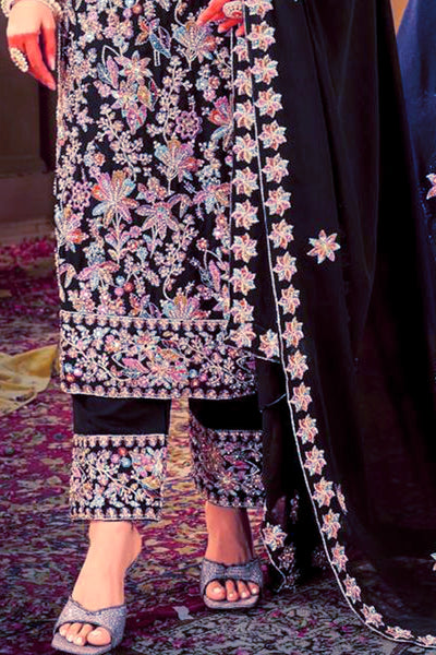 Traditional embroidered outfit with floral patterns on a dark backgroundTraditional embroidered outfit with floral patterns on a dark background