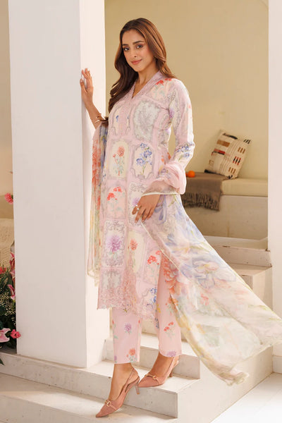 Woman wearing a floral kurta set in a bright interior settingWoman wearing a floral kurta set in a bright interior setting