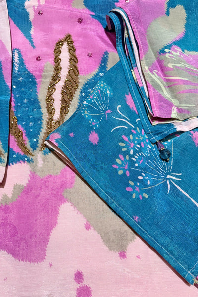 Blue dupatta with floral design on a pink and blue floral backgroundBlue dupatta with floral design on a pink and blue floral background