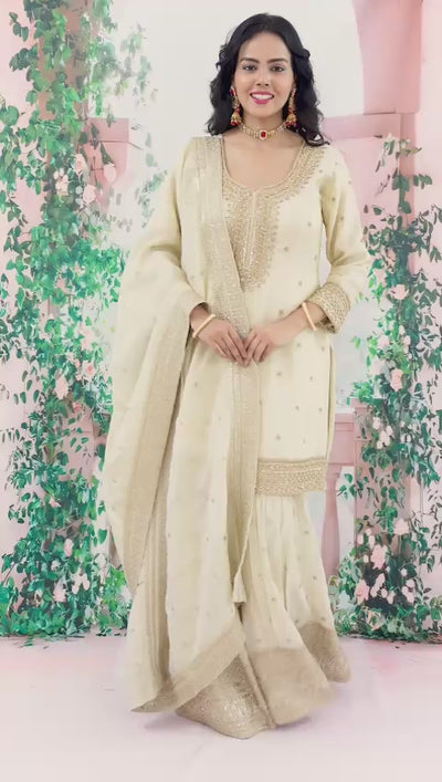 Buy Ivory Embroidered Shimmer Silk Gharara Style Suit at PinkPhulkariBuy Ivory Embroidered Shimmer Silk Gharara Style Suit at PinkPhulkari