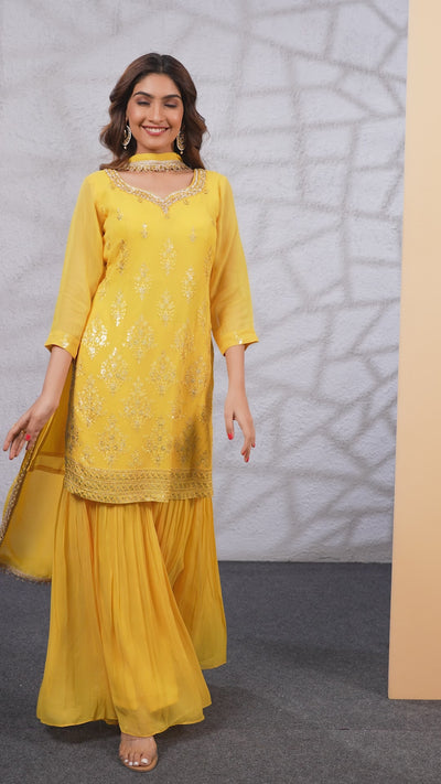 Buy Yellow Embroidered Gharara Style Suit at PinkPhulkari CaliforniaBuy Yellow Embroidered Gharara Style Suit at PinkPhulkari California